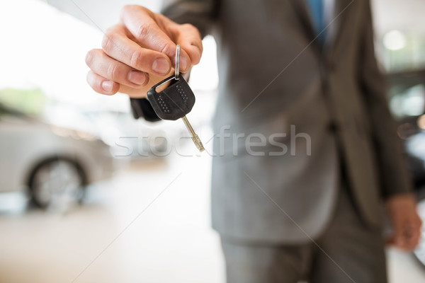 Close up of businessman giving car key Stock photo © wavebreak_media