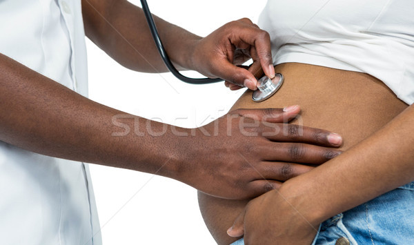 Doctor examining a pregnant woman Stock photo © wavebreak_media