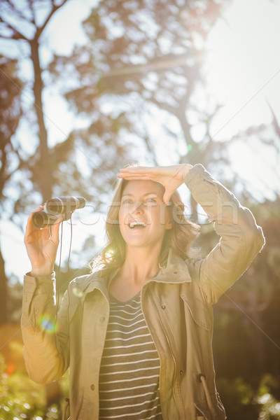 Mosolygó nő tart látcső vidék nő boldog Stock fotó © wavebreak_media