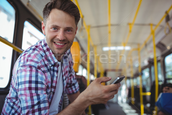 Portrait bel homme téléphone portable bus amour homme [[stock_photo]] © wavebreak_media