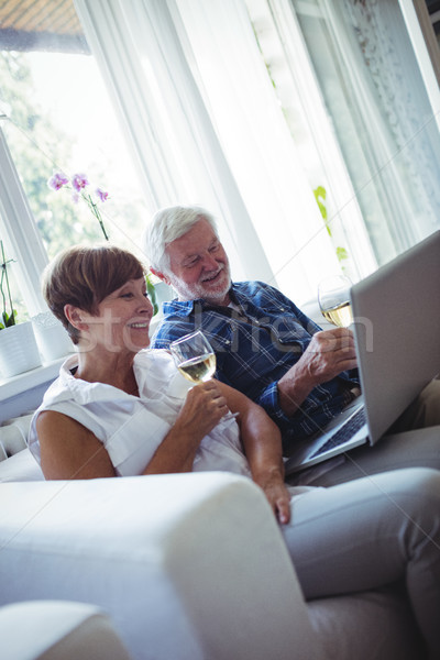 Stock photo: Senior couple using laptop