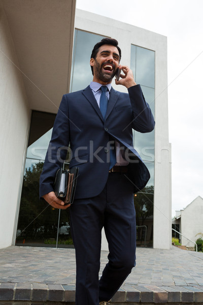 Stock fotó: üzletember · beszél · mobiltelefon · üzlet · férfi · megbeszélés