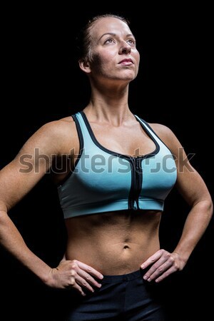 Androgynous person standing with his arms crossed Stock photo © wavebreak_media