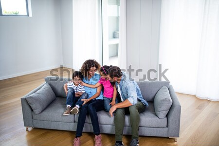 Parents and son playing with a laptop Stock photo © wavebreak_media