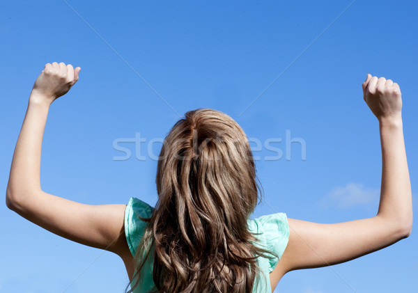 Attractive woman punching the air outdoor  Stock photo © wavebreak_media