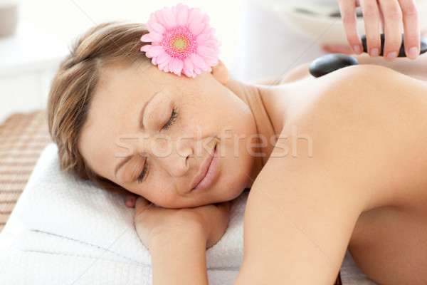 Stock photo: Portrait of a sleeping woman having a flower