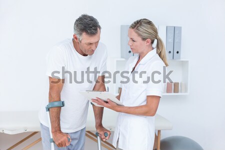 Sports students flirting in a cloakroom Stock photo © wavebreak_media