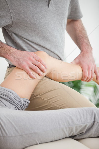 Leg of a patient being placed on the doctor in a room Stock photo © wavebreak_media