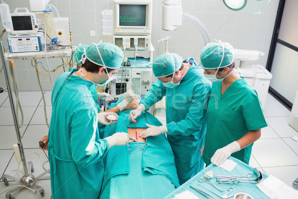 High angle view of surgeon operating in an operating theater Stock photo © wavebreak_media