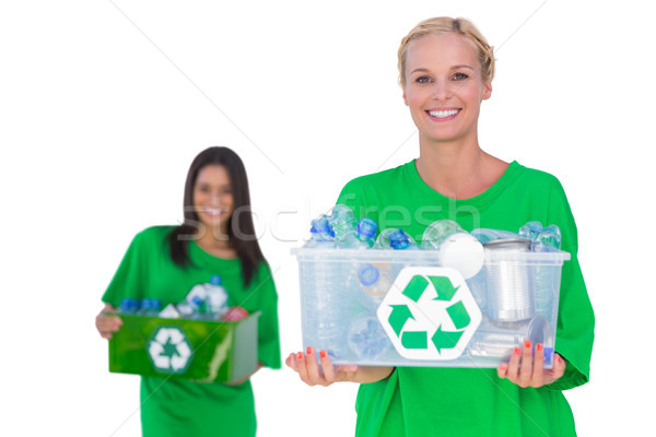 Pretty enivromental activists holding box of recyclables Stock photo © wavebreak_media