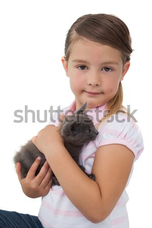 Cute meisje knuffelen grijs kitten witte Stockfoto © wavebreak_media