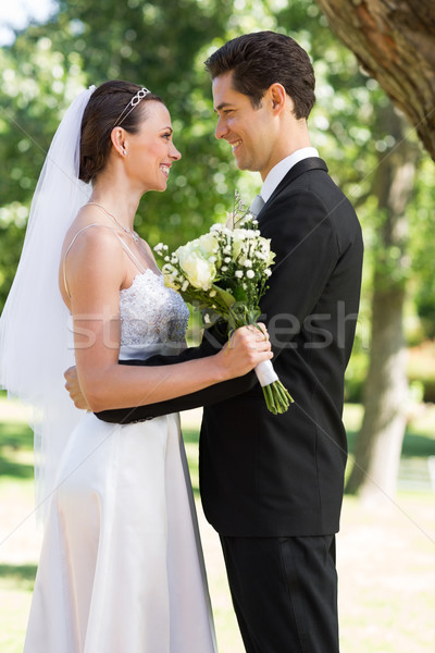 Newly wed couple looking at each other in garden Stock photo © wavebreak_media