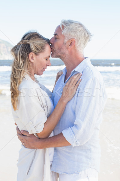 Man kissing his partner on the forehead at the beach Stock photo © wavebreak_media