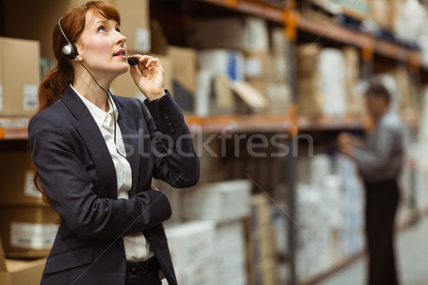 Stockfoto: Elegante · manager · praten · hoofdtelefoon · groot · magazijn