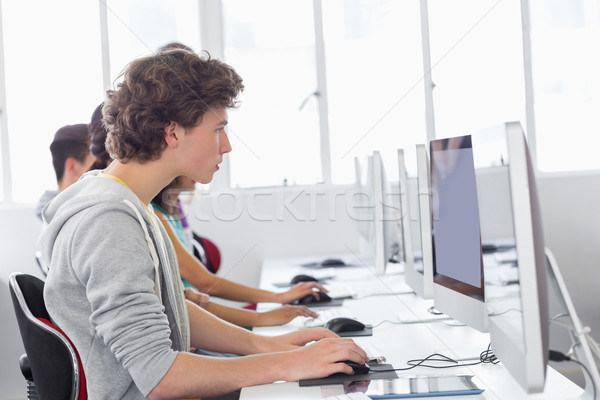 Student working in computer room Stock photo © wavebreak_media