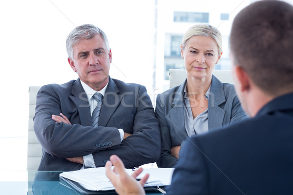 Gens d'affaires entrevue bureau homme portable technologie [[stock_photo]] © wavebreak_media