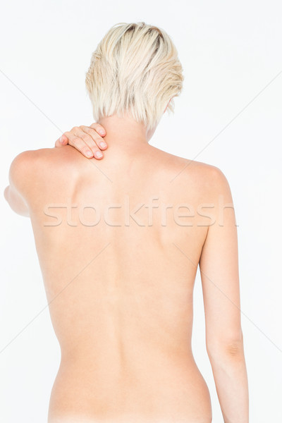 Attractive woman suffering from neck pain  Stock photo © wavebreak_media