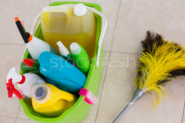 Bucket with cleaning supplies and mop on tile floor Stock photo © wavebreak_media
