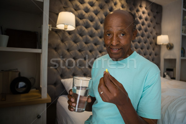 Portret starszy człowiek muzyka domu Zdjęcia stock © wavebreak_media