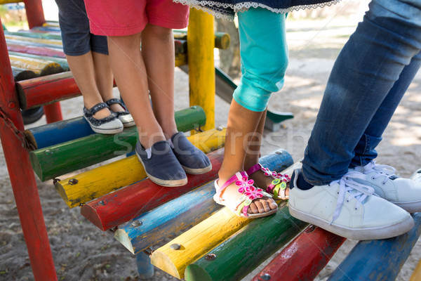 Low section of friends walking on jungle gym Stock photo © wavebreak_media