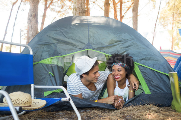 Happy couple talking in tent Stock photo © wavebreak_media