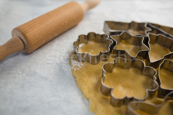 Close up of various pastry cutters over dough Stock photo © wavebreak_media