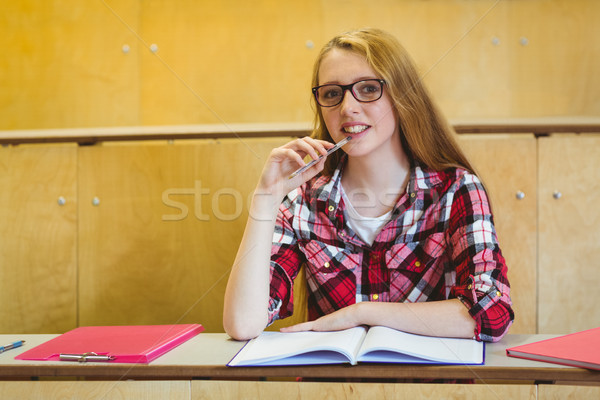 Sorridere studente seduta desk Università ragazza Foto d'archivio © wavebreak_media