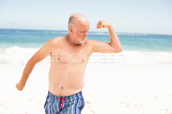 Senior man posing with his muscles Stock photo © wavebreak_media