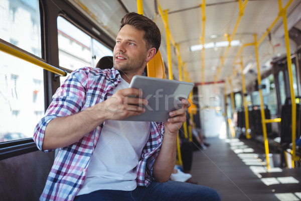 Yakışıklı adam dijital tablet otobüs sevmek adam Stok fotoğraf © wavebreak_media