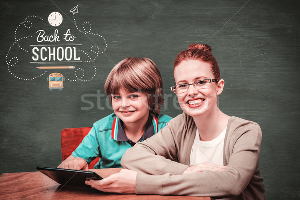 Composite image of happy pupil and teacher Stock photo © wavebreak_media