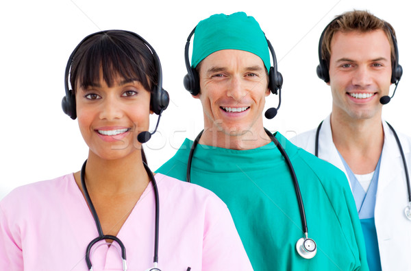 Happy medical team using headsets Stock photo © wavebreak_media