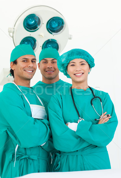 Smiling team of surgeon Stock photo © wavebreak_media