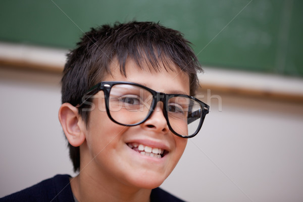 Közelkép mosolyog iskolás fiú osztályterem arc háttér Stock fotó © wavebreak_media