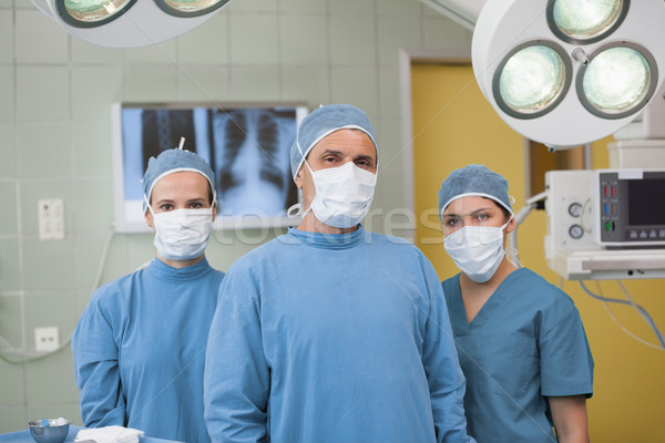 Front view of medical team in operating theater Stock photo © wavebreak_media