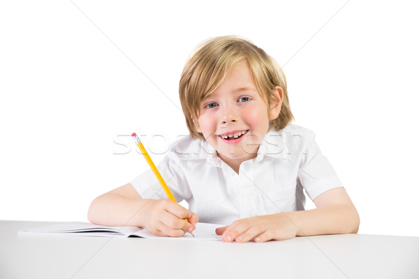 Zdjęcia stock: Szczęśliwy · dziecko · piśmie · w · dół · praca · domowa · biały