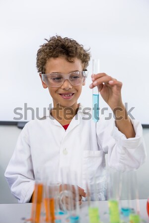 Concentrated scientist doing scientific experiment Stock photo © wavebreak_media