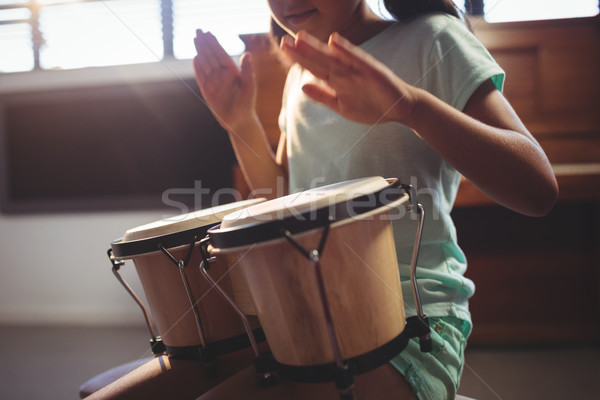 Középső rész lány játszik dobok osztályterem zene Stock fotó © wavebreak_media