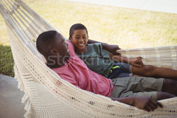 微笑 父親的兒子 放寬 吊床 花園 孩子 商業照片 © wavebreak_media