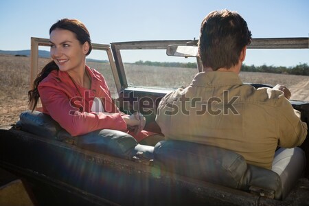 Couple reading map on off road vehicle Stock photo © wavebreak_media