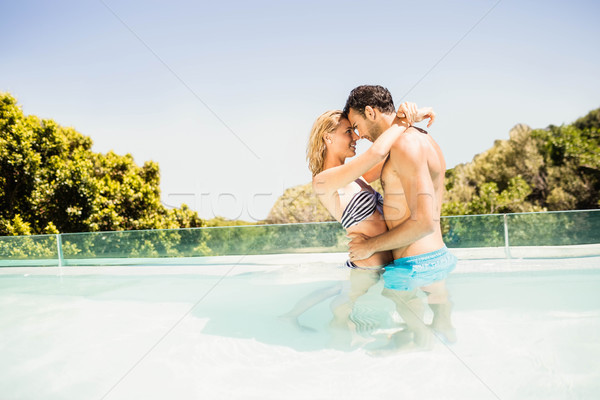 Happy couple embracing Stock photo © wavebreak_media