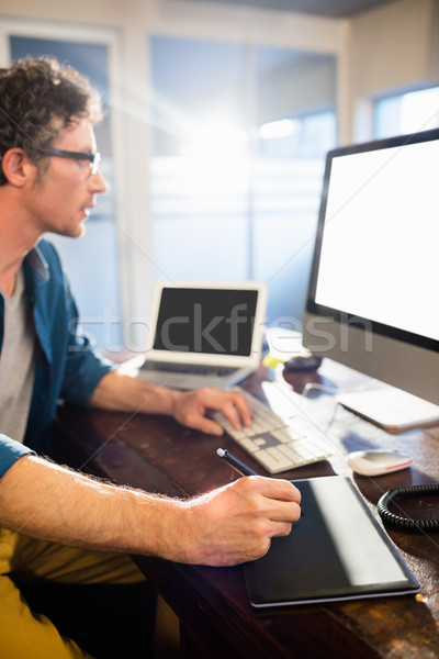 Businessman using a graphic pad Stock photo © wavebreak_media