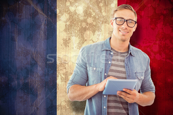 Composite image of student using tablet Stock photo © wavebreak_media