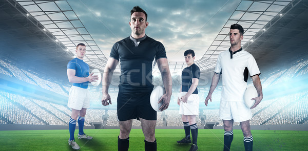 Composite image of rugby player holding rugby ball Stock photo © wavebreak_media