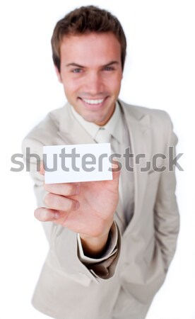 Stock photo: Charming businessman holding a white card 