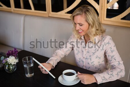 Young woman using a dishwasher Stock photo © wavebreak_media