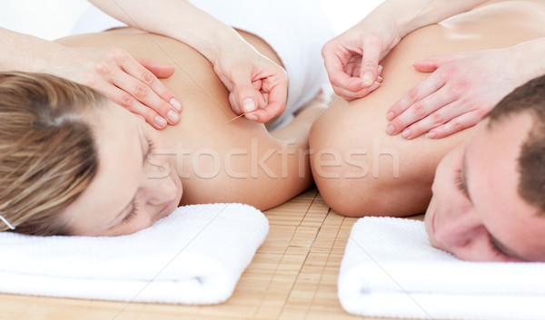 Couple acupuncture thérapie spa centre Photo stock © wavebreak_media
