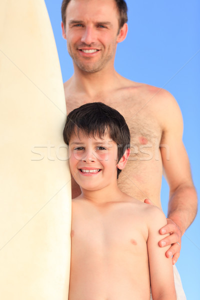 Father and son with their surfboards Stock photo © wavebreak_media