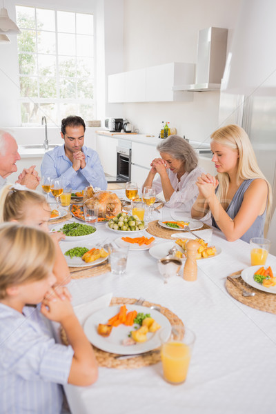 Family praying before eating Stock photo © wavebreak_media