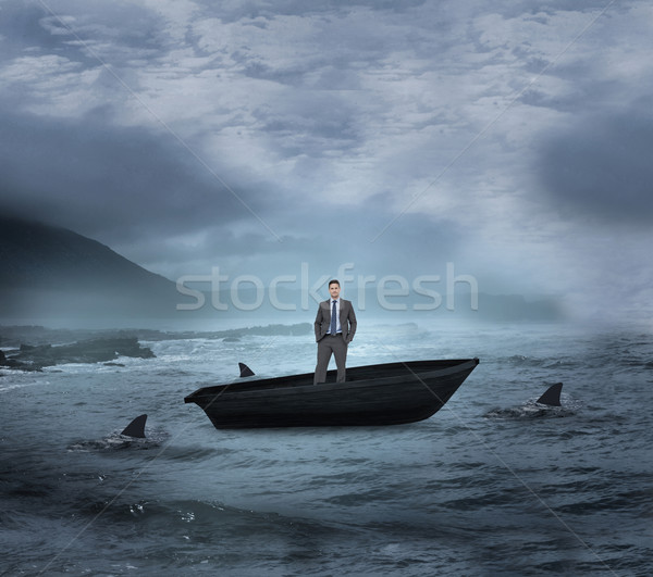 Composite image of thinking businessman in a sailboat Stock photo © wavebreak_media