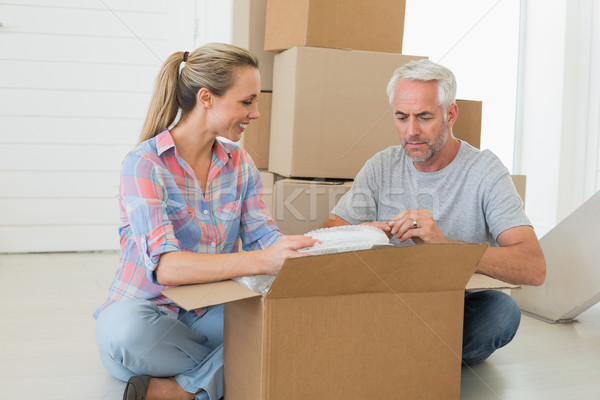 Boldog pár karton költözködő dobozok új otthon nő Stock fotó © wavebreak_media